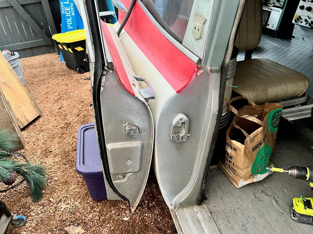 The rear passenger door opened up before the conversion