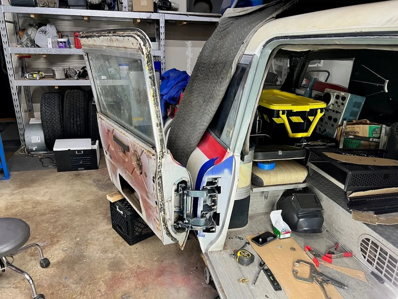 The rear door swung fully open on its new hinges