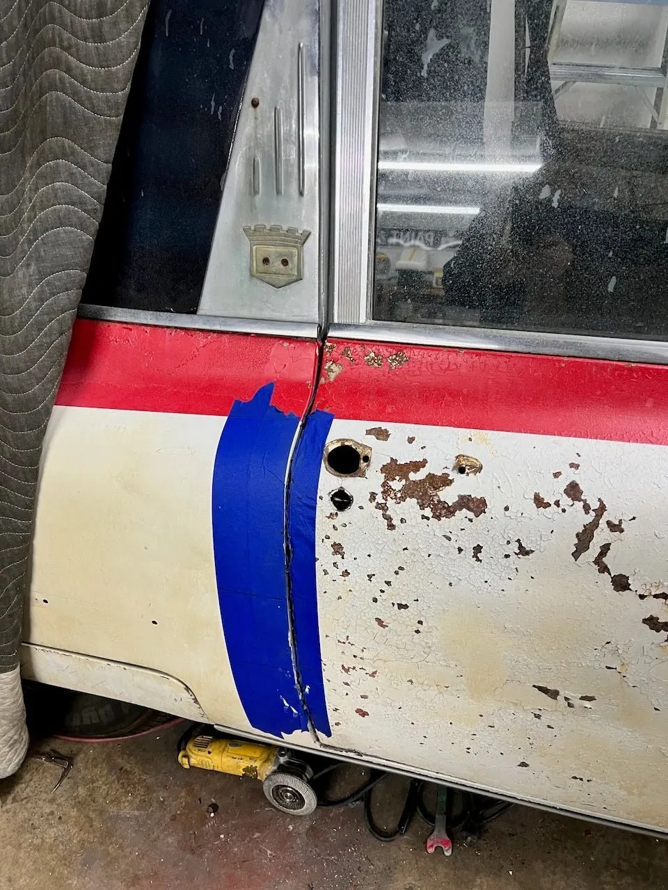 Door fitted back on the car