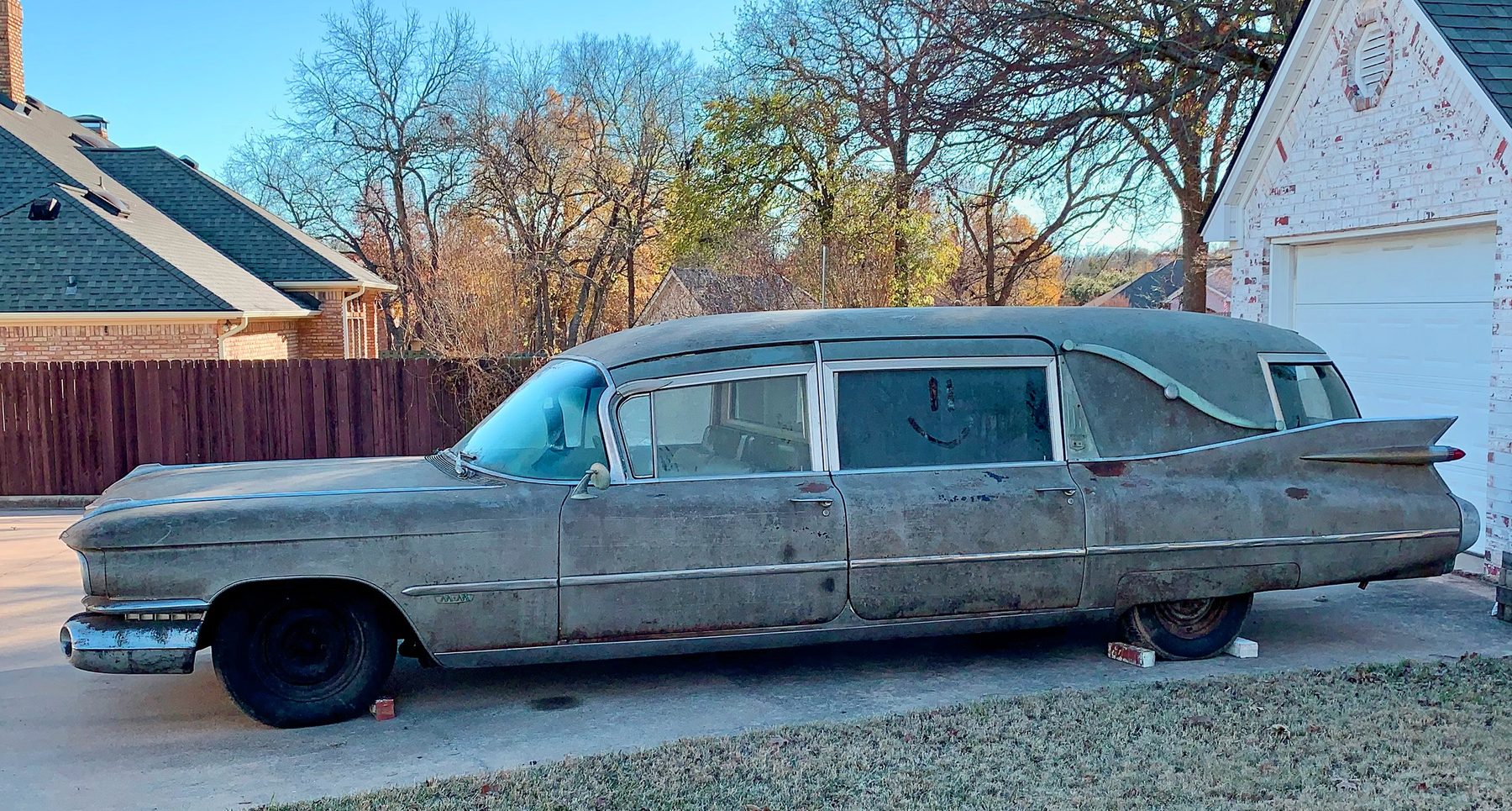 The 1959 Cadillac as found in 2020, after 49 years in a barn